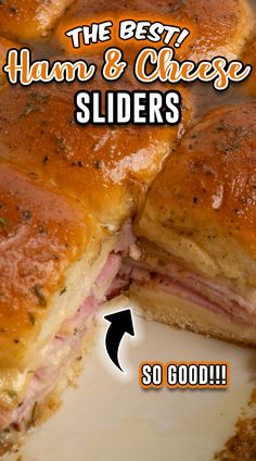 the ham and cheese sliders are cut in half on a white plate with an arrow pointing to it