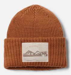 Stay warm and comfortable even when temps plunge in this knit beanie crafted with recycled fabric. A unique patch celebrates one of Oregon’s seven wonders, the Wallowa Mountains. Brown Cotton Beanie Hat, Outdoor Cotton Knitted Hat, Brown Knit Hat For Outdoor, Cozy Brown Beanie For Outdoor, Brown Knit Beanie For Outdoor, Brown Knitted Cotton Hat, Columbia Beanie, Seven Wonders, Cozy Knit