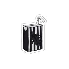 a black and white striped bag with scissors sticking out of it