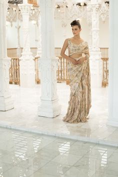 One of our favourites, the crushed digitally printed drape saree comes with khaadi silk floral embroidered koti. This timeless piece can be worn to any occasion and can easily be dressed up or down according to your needs. Brocade Pre-draped Saree With Resham Embroidery, Floral Print Silk Pre-draped Saree, Designer Chanderi Pre-draped Saree With Floral Print, Pre-draped Cotton Silk Saree With Printed Motifs, Brocade Pre-draped Saree For Reception, Bollywood Silk Pre-draped Saree With Printed Motifs, Designer Brocade Pre-draped Saree With Resham Embroidery, Bollywood Style Brocade Pre-draped Saree For Designer Wear, Traditional Drape Choli With Printed Motifs For Reception