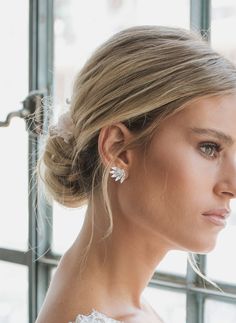 Accessorize you wedding gown with a trail of marquise diamonds set in 14 karat gold, rose gold or silver. The stunning Bridal Ear Jacket cut of the diamonds will reflect light and illuminate the face so you can shine like a star on your wedding day. These vintage but modern earrings are the perfect addition to your gorgeous wedding gown but will also make a great addition to any formal attire long after that special day. The elegance of these Swarovski crystal earrings will make a statement enti White Marquise Diamond Bridal Earrings, Diamond White Marquise Diamond Bridal Earrings, White Gold Marquise Bridal Earrings, Marquise Cut White Gold Diamond Earrings For Wedding, Diamond Earrings With Diamond Eyes, White Gold Marquise Cut Diamond Wedding Earrings, Marquise Cut White Gold Diamond Wedding Earrings, Elegant Marquise Diamond Cut Cluster Earrings, Marquise Diamond White Earrings