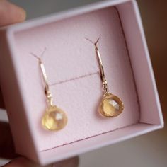 Sparkling Genuine Citrine Dangle Earrings, Handmade by BoutiqueBaltique.  MATERIALS: * 14k Solid Gold * natural citrine * dangling from leverbacks * beautiful branded gift box + card about citrine SIZE: stones: 8x8 mm; earrings: 2.5 cm or 1" MAKE A SET: Matching necklace: https://etsy.me/2zrtFer CITRINE: ∙ November Birthstone ∙ 13th Wedding Anniversary Gemstone ∙ Talisman for Aries, Gemini, Leo, Libra ∙ Sacral Chakra (Swadhisthana)  Citrine symbolizes wealth, prosperity, and success. It clears the mind and stirs to action, imparting enthusiasm and delight in things the wearer does. Citrine carries the power of the Sun, which turns negative energies into positive ones and enriches the life of the wearer. SEE MORE: Citrine Jewelry:  http://etsy.me/2dkORJO  November Birthstone Jewelry:  http: Teardrop Citrine Jewelry For Gifts, Teardrop Citrine Earrings For Gift, Citrine Teardrop Earrings For Gift, Citrine Dangle Earrings As A Gift, Handmade Briolette Yellow Gold Earrings, Handmade Yellow Gold Briolette Earrings, 14k Gold Briolette Earrings Gift, Faceted Drop Earrings As Gift, Gift Yellow Gold Jewelry With Lever Back Ear Wires