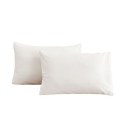 two white pillows sitting next to each other