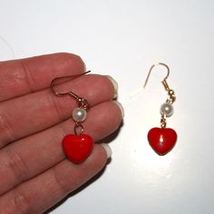 "Sweet Little Red Heart and Pearl Earrings These measure 1.7\" long including the hook" Vintage Red Heart Earrings For Pierced Ears, Red Vintage Heart Earrings, Handmade Heart Earrings For Valentine's Day Gift, Red Vintage Heart Earrings For Gifting, Vintage Heart Earrings For Valentine's Day, Vintage Red Heart Earrings For Gift, Red Vintage Heart Earrings For Gift, Vintage Red Heart Earrings As Gift, Red Heart Drop Earrings For Valentine's Day