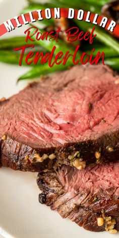 a close up of a steak on a plate with green beans