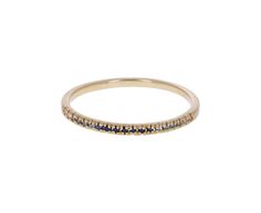 With a quiet, regal, and understated sophistication, this Rebecca Overmann ring is a striking, modern alternative to the traditional wedding band. The blue gray sapphires are prong set in the 14K yellow gold band according to tone. A wedding band alternative or addition to a stacking set! 14K yellow gold band width : 2mmsapphires : 1mm diameter each : .10cttwsize available : 6.75please contact us for sizing options Timeless Stackable Yellow Gold Sapphire Ring, Elegant Yellow Gold Sapphire Eternity Band, Classic Stackable Sapphire Rings In Yellow Gold, Yellow Gold Stackable Rings With Sapphire In Round Band, Formal Yellow Gold Stackable Sapphire Ring, Classic Gold Sapphire Ring With Half Eternity, Gold Sapphire Ring With Half Eternity Band, Yellow Gold Stackable Sapphire Ring With Round Band, 14k Gold Sapphire Halo Ring With Round Band