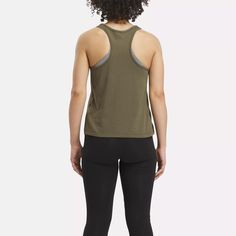 Wear your Reebok pride front and center. This women's training tank top features a bold Vector logo to go with your sporty style. The single jersey cotton has a breezy feel that keeps you comfy through light workouts and long, lazy afternoons. Sporty Racerback Tank Top For Gym, Sporty Go-dry Activewear With Racerback, Sporty Go-dry Racerback Activewear, Sportswear Racerback Tank Top Sweat Resistant, Sportswear Yoga Tank Top With Go-dry Technology, Athletic Fit Racerback Activewear, Breathable Racerback Tops Sportswear, Breathable Racerback Sportswear Tops, Sporty Cotton Tank Top