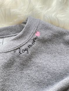 Name Sweatshirt. 50/50 cotton poly unisex sweatshirt. Includes 1-3 names, please keep in mind font size does not change and longer names will cover more of the collar. We can use any pattern you see in our shop at www.Etsy.dukeandfox.com so you can match your fur baby! All our sweatshirts are made to order and ship after a 3-5 day production time. Please message us with any custom request prior to ordering. www.dukeandfox.com Cotton Crew Neck T-shirt With Lettering, Crew Neck Cotton Sweatshirt With Letter Print, Cotton Crew Neck Sweatshirt With Letter Print, Basic Cotton Sweater With Letter Print, Cotton Letter Print Crew Neck Sweatshirt, Cotton Crew Sweats With Letter Print, Basic Cotton Sweatshirt With Letter Print, Cotton Long Sleeve Sweatshirt With Name Print, Cotton Crew Sweatshirt With Name Print