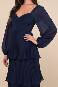 Let everyone be impressed by your stunning style in the Lulus Impactful Elegance Navy Blue Tiered Balloon Sleeve Maxi Dress! Airy, lightweight woven fabric shapes this gorgeous dress that has long balloon sleeves with elastic at the cuffs and shoulders. Sweetheart neckline tops a pleated bodice with a ruched detail at the front and a fitted waist. Accordion-pleated skirt falls in graceful tiers to a maxi hem. Hidden zipper/clasp at back. Fit: This garment fits true to size. Length: Floor length. Pleated Skirt Fall, Fall Formal Dresses, Sweetheart Neckline Top, Casual Formal Dresses, Dress With Pleats, Fall Wedding Guest Dress, Stunning Style, Blue Dress Formal, Lulu Fashion