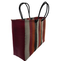 Oaxaca tote Bag, Handmade Mexican Bag, Getaways bag, Travel Bag, Basket, Beach Bag,vegan bag ,Plastic Woven, Oaxaca Bag, recycled plasticThe specifics are impressive: the bag is woven from a heavy duty, pliable plastic that is near indestructible. The weave is so tight, the bag is waterproof, which alone makes it uniqueApproximate measurements.13.5 h x 17 w x 5.5 d34 x 43 cmPlease note, since this piece is made by hand there may be some imperfections. Instead of viewing this as a mistake, let it Eco-friendly Red Shoulder Bag For Shopping, Multicolor Rectangular Bucket Bag For Market, Eco-friendly Red Handwoven Shoulder Bag, Eco-friendly Red Tote Beach Bag, Eco-friendly Red Handwoven Bag, Red Rectangular Beach Bag For Everyday Use, Red Handwoven Beach Bag For Market, Red Handwoven Tote Bag, Eco-friendly Handwoven Red Shoulder Bag