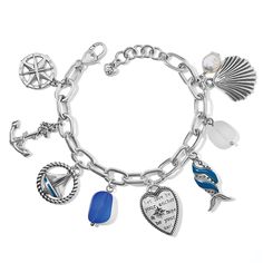 This chunky chain bracelet combines the best of modern and vintage style with its array of silver-plated and hand-enameled charms, and a heart inscribed with, “Let love be your anchor and hope be your sail.” Color: Silver-Blue Closure: Lobster Claw Width: 1 1/2" Length: 7 1/4" - 8 1/4" Adjustable Material: Fine quality crystals and glass pearl, Glass bead, Enamel Finish: Silver plated Brighton Charm Bracelet, Lily Bracelet, Brighton Bracelets, Circle Bracelet, Silver Plated Bracelet, Brighton Jewelry, Signature Jewelry, Pink Bracelet, Heart Bracelet