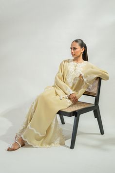 Jiya (B) – Sania Maskatiya International Festive Cream Kaftan With Resham Embroidery, Cream Kaftan With Resham Embroidery For Festive Occasions, Cream Resham Embroidery Kaftan For Festive Occasions, Yellow Chikankari Embroidery Kaftan, Spring Wedding Kaftan With Dabka Work, Festive Beige Kaftan With Resham Embroidery, Bohemian Cream Sets For Eid, Embroidered Straight Kurta Dress In Cream, Embroidered Cream Straight Kurta Dress