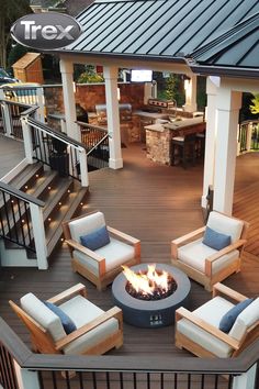 a fire pit sitting on top of a wooden deck