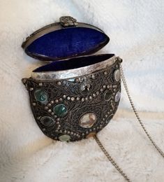 "This beautifully made metal handbag purse is intricately made with metalwork, jewels, stones and lined with a cobalt blue lining.  Reminiscent of Victorian era accessories. The purse is 5\" x 4.5\" x 2\" with a 34\" chain." Metal Evening Bag, Elegant Metal Rectangular Shoulder Bag, Elegant Rectangular Metal Shoulder Bag, Formal Rectangular Metal Shoulder Bag, Silver Metal Elegant Shoulder Bag, Rectangular Metal Evening Bag For Gifts, Rectangular Metal Evening Bag Gift, Gold Bohemian Evening Bag, Traditional Openable Evening Bag