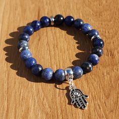 8mm Sodalite Beaded Stretch Bracelet Handmade By Me Hamsa Tibetan Silver Charm Stainless Steel Rondelles Fits Up To 7" Wrist New Ring Not Included Adjustable Sodalite Beaded Bracelets With 8mm Beads, Handmade Sodalite Round Bead Bracelets, Blue Sodalite Beaded Bracelets With 8mm Beads, Blue Sodalite Gemstone Beaded Bracelets, Blue Sodalite Hand-strung Beaded Bracelets, Candy Bracelet, Handmade Friendship Bracelets, Slide Bracelet, Kandi Bracelets