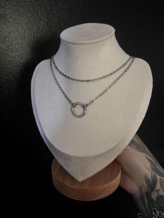 A gorgeous dainty 12mm O ring choker necklace with a double chain layer, perfect to wear as a stand alone piece or with other longer chains!  The chains are 14 and 15 inches in length, meaning they will sit high up on your neck (so you can show it off)  The chain and O ring are both made with stainless steel.  Stainless steel is fully hypoallergenic and anti rust, meaning it isn't affected by water, sweat or perfumes.                           * PLEASE READ *  All jewellery is hand made to order O Ring Choker, Layered Choker Necklace, Layered Chokers, Ring Der O, Minimalist Gifts, Necklace Box, Double Chain, Long Chain, O Ring