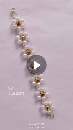 an image of a bracelet with pearls and gold beads on the end, as well as a video about how to wear it