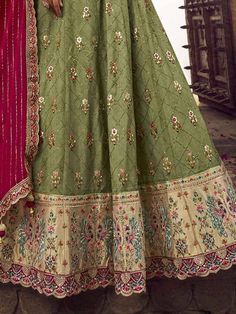 Be an angel and create and establish a smashing influence on every person by wearing this excellent teal green color lehenga made of viscose silk material adorned with embroidery work, sequin work, and a beautiful peacock motif. This gorgeous teal green lehenga comes with a pink color blouse of viscose silk material designed with embroidery and sequin work. It also comes with a a pink color bamberg silk material dupatta crafted with gorgeous lace border work. This teal-green traditional lehenga Teal Green Lehenga, Green Color Lehenga, Stylish Lehenga, Peacock Motif, Bridesmaid Lehenga, Teal Green Color, Green Lehenga, Color Embroidery, Traditional Outfit