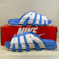 New Nike Air More Uptempo Slide Unc Size Mens 12 Color University Blue Padded Strap, Air Overlays, Foam Footbed, Visible Air Unit For Cushioning, Rubber Outsole Brand New, Never Worn, With Box Nike Cushioned Slides, Nike Low-top Slides With Cushioned Footbed, Casual Slip-on Slides With Air Cushioning, Blue Sporty Slides For Streetwear, Sporty Blue Slides For Streetwear, Breathable Blue Slide Sandals, Nike Sneakers With Air Cushioning For Summer, Casual Air Max Cushioned Sneakers For Summer, Light Blue Casual Sneakers With Air Cushioning