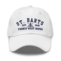 The St. Barts Souvenir White Hat with Navy Embroidered Letters, is a classic cap perfect for a Caribbean souvenir of this French West Indies Leeward island. Wearing this hat will put your mind right back on this stunning Caribbean island. The St. Barts hat features surfboards, an iconic anchor, and the year this island was established as a French colony. Whether you're a St. Barts islander, a passionate traveler, love to windsurf, surf, or simply someone who loves this Antilles chain of islands, Vintage White Dad Hat, Vintage White Baseball Cap With Letter Print, Vintage White Dad Cap, Vintage White Hat With Embroidered Logo, White Vintage Hat With Embroidered Logo, Classic White Baseball Cap With Letter Print, Classic White Hats With Letter Print, Vintage Short Brim Hat With Letter Print, Saint Barth