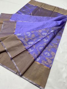 For any questions Whatapp Us: +4591718558 Visit www.silktatva.com for extra discounts Chanderi silk sarees are known for their sheer texture and light weight. This saree is woven with Copper zari handwork borders and elegant pallu to match in Pattu Silk. There are all over Copper zari and silver zari jaal in the body of the saree. The saree includes an unstitched blouse piece that matches the saree color and design.  The saree is 100% Pure Chanderi Handloom saree that comes with an assurance of Jungle Theme, Traditional Sarees, Handloom Saree, Community Group, Latest Updates