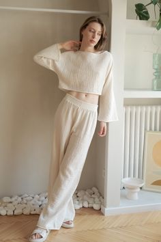 Walk into your day with our soft and light-weighted cotton Skye Palazzo Pants Natural With Gold Stripes, designed to make you feel confident and relaxed throughout your day. Feel at your best silhouette with these loose-fitting lounge pants featured with elasticated high waist to accentuate your natural waist. - 100% Turkish cotton- One size fits most- Elasticated waist Gold Stripes, Local Artisans, Wide Sleeves, Palazzo Pants, Lounge Pants, Feel Confident, High Waisted Shorts, Environmentally Friendly, High Waist