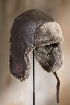 A rugged leather exterior with a pebbled texture fends off wind and cold while the inside offers the natural insulation of warm shearling wool. Free shipping   returns. Luxury Leather Outdoor Hats, Aviator Hat Pattern Sewing, Knit Aviator Hat Pattern, Luxury Leather Felt Hat For Winter, Canada Goose Aviator Hat, Aviator Hat Pattern Free, Apocalyptic Accessories, Rugged Leather, Aviator Hat