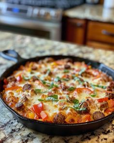 a pizza in a pan sitting on top of a counter