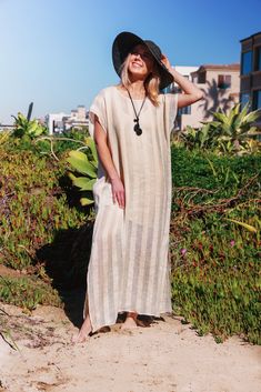 Whether you will wear it as an over-bikini cover-up, or as a dress on its own, you will be able to achieve an elevated look with our Collette Kaftan. Delicate and sophisticated, this linen kaftan will be a perfect fit at a resort by the sea, or at any poolside setting. You can also wear it as a tunic over a slip dress, shorts and even jeans. Collette Kaftan is one size. Due to its breathable transparency, you can purchase it together with our Leah cotton slip dress, that is available in sizes S,