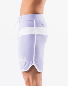 HIGHLIGHTS.. Unlined boardshort. 9” inseam Reflective branding at leg opening and back waistband Elastic waistband with adjustable self-tie drawcords Color-blocking panelling Water resistant fabric FIT SUGGESTION. This item runs true to Alphalete’s standard sizing.. Fit is based off of waist size in inches.. If you are between sizes, we recommend sizing up for a relaxed fit.. Eric is 6’2”/188cm, wearing a size 32. MATERIALS AND WASHING DIRECTIONS. 67% Nylon, 23% spandex. Due to the high saturati Sporty Fitted Surfing Bottoms, Sports Bottoms With Built-in Shorts And Tie-sides, Sporty Fitted Swim Trunks With Drawstring, Sporty Fitted Bottoms With Functional Drawstring, Sporty Fitted Tie-side Bottoms, Sporty Swimwear With Adjustable Waist And Short Shape, Fitted Tie-side Bottoms For Water Sports, Sporty Swimwear With Adjustable Waist Shorts, Sporty Swimwear With Adjustable Waist