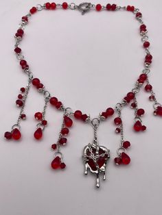 Made with glass beads and soldered heart charm. Heart Dripping, Blood Necklace, Charm Necklaces, Soldering, Heart Charm, Charm Necklace, Beauty Book, Glass Beads, Etsy Accessories