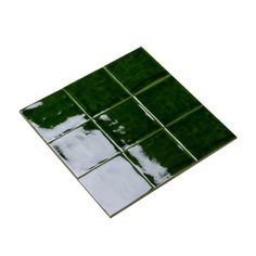 a green square tile on a white background