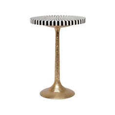 a gold pedestal with black and white stripes on the top, sitting in front of a white background