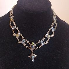 Simply beautiful. Vintage Mary DiMarco 15.5" long Antiqued double chain with Blue, Green and Yellowstones. in the center is 1" Dangle with additional blue stones. be sure and check out my other listings for more Mary DiMarco Blue Metal Crystal Necklaces For Jewelry Making, Blue Crystal Necklaces For Jewelry Making, Elegant Blue Metal Chain Necklace, Elegant Blue Dangle Crystal Necklaces, Blue Wire Wrapped Metal Necklace, Blue Costume Jewelry Necklace With Chain, Blue Metal Jewelry With Adjustable Chain, Blue Costume Jewelry With Chain, Blue Chain Costume Jewelry