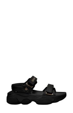 Cushy and versatile, this sandal topped with soft leather features a chunky, sculpted sole and Jordan detailing popping in golden shimmer. 2" heel, 1" platform; 1" slope (size 11) Adjustable hook-and-loop straps Leather upper and lining/rubber sole Imported Nordstrom x Nike: A curated lifestyle destination where fashion is the ultimate sport Givenchy Black Sandals, Nike A, Sandals Outfit, Strap Sandals Women, Black Metallic, Metallic Gold, Strap Sandals, Black Sandals, Everyday Outfits