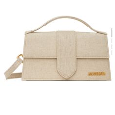 New Condition Linen Le Grand Bambino Bag With Dust Bag Beige Double Handle Flap Bag With Dust Bag, Beige Shoulder Flap Bag With Dust Bag Included, Designer Beige Box Bag With Adjustable Strap, Beige Top Handle Flap Bag With Removable Pouch, Beige Flap Bag With Gold-tone Hardware And Double Handle, Jacquemus Bags, Jacquemus Bag, Denim Shoulder Bags, Suede Tops