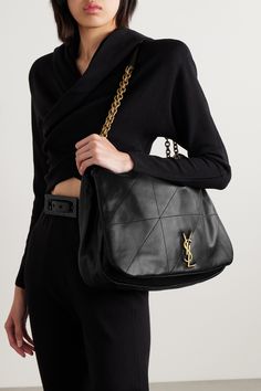 When you invest in a SAINT LAURENT bag, you take home a small piece of the maison's illustrious legacy. This 'Jamie' style has been crafted in Italy from supple quilted leather and embellished with the unmistakable 'YSL' logo. The gold-tone chain strap has a generous drop, so it'll slip comfortably over your shoulder. Ysl Purse Net-a-porter, Black Ysl Bag Quilted, Ysl Bag Maxi, Ysl Black Bag Neiman Marcus, Ysl Handbags Neiman Marcus, Ysl Manhattan Shoulder Bag, Ysl Black Cross Body Bag, Net A Porter Handbags, Luxury Black Bags