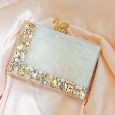 rhinestone resin clutch have enough space to carry phone, this clutch very luxurious and give charm to your outfit which you wear in wedding or party Portable Rectangular Bag For Gifts, Rectangular Gift Bag, Portable White Rectangular Box Bag, White Rectangular Box Bag For Gifts, White Square Box Bag For Party, White Pouch Box Bag For Gift, White Pouch Box Bag As Gift, Rectangular Portable Box Bag Gift, White Rectangular Clutch