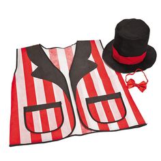 a hat, vest and tie are sitting on top of a red and white striped blanket