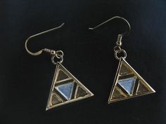 I've fabricated these unique sterling silver and 24K gold-plated Legend of Zelda inspired TriForce earrings. These are substantial and have some weight, though not so much to weigh down the earlobes. These are 1 inch in diameter and a lovely, unique keepsake for those who enjoy everything Zelda! Please feel free to convo if you have any questions and I'll answer quickly. Allow 3 days for fabrication prior to shipment. Thanks for looking! Artistic Gold Jewelry For Ceremonial Occasions, Symbolic Gold Sterling Silver Earrings, Gold Hand Cast Dangle Earrings, Ceremonial Gold Sterling Silver Earrings, Triforce Earrings, Zelda Earrings, Felt Bag, Moon Pendant, Bridal Headpieces