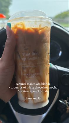 a person holding up a cup filled with liquid in the middle of their hand and text that reads, that first sip feeling caramel macchiaia blonde 4 pumps of white chocolate