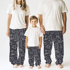 Cozy Christmas matching family pajama pants for men, women, and kids.  Super soft feel with an elastic waistband and hand drawn Christmas art, they are the perfect gift under 50. Product features - 100% Polyester for durability and quick drying - Soft hand-feel and smooth printing canvas - Elastic waistband for comfort - Printed-in size and care label for convenience - Assembled in the USA from globally sourced parts Care instructions - Do not dryclean - Do not iron - Tumble dry: low heat - Do not bleach - Machine wash: cold (max 30C or 90F) Casual Christmas Sleepwear With Elastic Waistband, Christmas Cotton Sleep Pants, Casual Christmas Sleep Bottoms, Cotton Pants For Christmas Loungewear, Cotton Lounge Pants For Christmas, Casual Christmas Sleepwear Relaxed Fit, Christmas Cotton Bottoms With Elastic Waistband, Christmas Loungewear Pants, Casual Christmas Holiday Pants