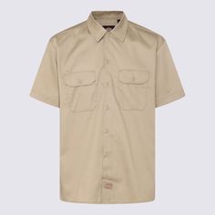 Khaki cotton shirt from Dickies featuring short sleeves, button closure, chest flap pockets, regular fit and cotton logo patch at bottom.Composition: _, 100% Cotton Solid Color Short Sleeve T-shirt With Pockets, Classic Short Sleeve Button-up Shirt With Snap Buttons, Utility Shirt With Patch Pockets And Collar, Collared Utility Shirt With Patch Pockets, Classic Cotton Button-up T-shirt, Cotton Utility Shirt With Camp Collar, Casual Khaki Shirt With Patch Pockets, Collared Cotton Shirt With Pockets, Cotton Collared Shirt With Pockets