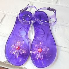 Jelly Ankle Strap Sandal Sequin Embellished Butterfly Toe Separator .5in Heel Purple Ankle Strap Sandals For The Beach, Purple Adjustable Sandals For Party, Adjustable Purple Sandals For Vacation, Purple Ankle Strap Sandals For Summer, Purple Open Toe Jelly Sandals For Summer, Purple Round Toe Jelly Sandals For Spring, Purple Jelly Sandals For Beach In Spring, Lavender Sandals For Summer Party, Spring Purple Jelly Sandals With Round Toe