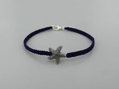 Embrace a holiday feeling every day with this UK made dainty 7" adjustable friendship bracelet for women.  It extends up to 8" so is ideal if you are buying this as a gift and do not know the exact wrist size of your recipient.  * Silver plated secure clasp and 1" extender chain.   * Zinc alloy sea star - lead, cadmium and nickel free. * Handmade in Cornwall using strong dark purple nylon cord.   ★ ALSO INCLUDED ★ Your bracelet will be wrapped in cream tissue paper inside a matching organza bag Adjustable Friendship Bracelet, Everyday Bracelet, Purple Bracelet, Sea Star, Macrame Bracelets, Bracelet For Women, Braided Bracelets, Heart Bracelet, Organza Bags