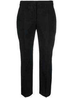 Black wool low-rise cropped trousers from Alexander McQueen featuring low-rise, concealed front fastening, rear welt pocket, pressed crease, slim cut and cropped leg. | Alexander McQueen Low-Rise Cropped Trousers Cropped Trousers, Curator Style, Black Wool, Bottoms Pants, Welt Pocket, Low Rise, Womens Bottoms, Alexander Mcqueen, Alexander