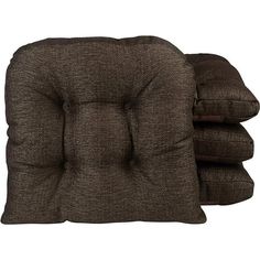 three brown cushions stacked on top of each other