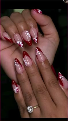 Awesome 80s Nail Art That Will Take You Back to Another Era Almond Nails Designs Red French, Nails With French Tip And Flowers, Almond White Nails With Designs, Nail Art On Almond Shape Nails, Red French Tip Nails With Flower, Red French With Design, French Almond Nails With Flowers, Almond Nails With Red Design, Nail Inspiration For Beginners