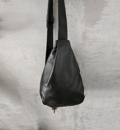 This beautiful Women's Sling Bag is the perfect accessory for any women. Made from soft premium Italian leather Black color, this bag provides just the right amount of style and function. The large size is perfect for hands-free carrying and storing your everyday essentials. ◄ DIMENSIONS ► Height: 36 cm / 12" Width: 27 cm / 8.8" Features► * Adjustable cross body strap * Fully lined * 3 inside different departments with a zippered closure  * YKK Metal zip. VISIT THE REST OF THE SHOP ► www.etsy.co Womens Sling Bag, Leather Sling Bag, Backpack Women, Sling Bags, Big Bags, Etsy Fashion, Bag For Women, Everyday Essentials, Leather Purse