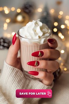 Imagine holding a cup of hot cocoa, nails wrapped around the mug, and adorned with tiny gold Christmas trees. This design takes a vibrant red base and adds a pop of gold with metallic Christmas tree accents. The look is chic and festive without going overboard, making it a great choice for someone looking for an understated yet playful holiday look. Cocoa Nails, Metallic Christmas Tree, Gold Christmas Trees